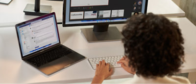 A person typing on a keyboard