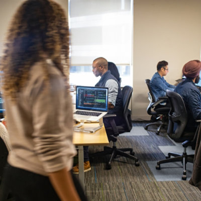 A group of people in an office.