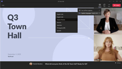 Dwie osoby uczestniczące w spotkaniu wirtualnym „q3 town hall” z nakładką menu wyboru języka.
