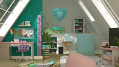 View of a child’s bedroom and play area decorated with many pastel colors.