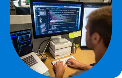 A screen displaying written code and a notification alerting the user that a vulnerability was found in the code.