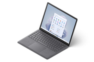 An open Surface Laptop 5 showing the Windows home screen.