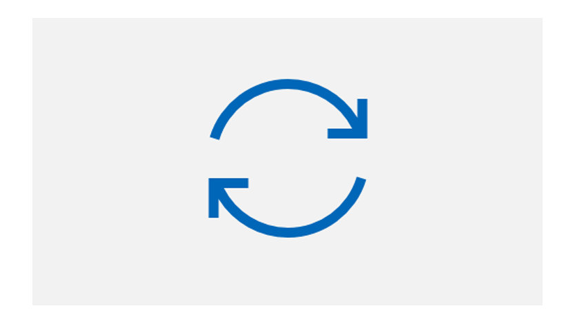 Blue icon of two arrows pointing in a loop of each other.