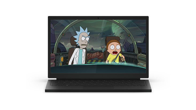 On a laptop screen, Rick and Morty travel inside a time machine, both looking scared