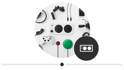 An Xbox Adaptive Controller surrounded by its complimentary peripherals.