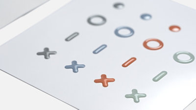 Surface Adaptive Kit 3-dimensional bump labels in many distinct shapes.