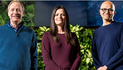 Photo of Microsoft President Brad Smith, Chief Financial Officer Amy Hood and CEO Satya Nadella.