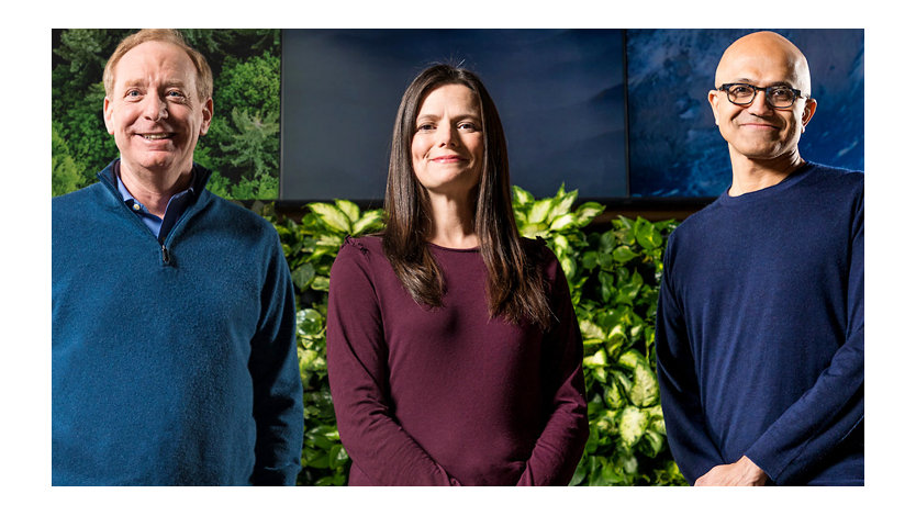 Photo of Microsoft President Brad Smith, Chief Financial Officer Amy Hood and CEO Satya Nadella.