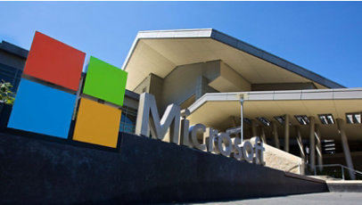 Microsoft sign in front of a building
