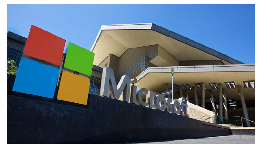 Microsoft building with prominent Microsoft logo in forefront