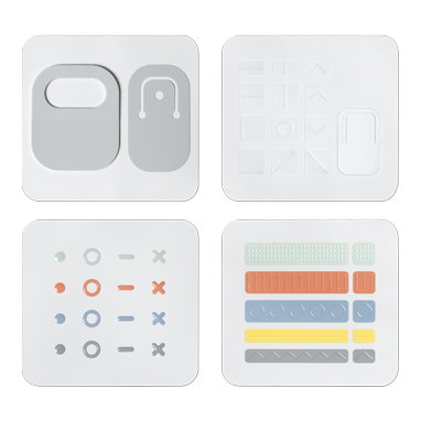 Primer plano de los accesorios disponibles de Accesorios adaptables de Microsoft, como un ratón con distintas opciones de palancas.