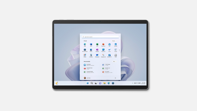 Surface Pro 9 shown straight on with Windows 11 start screen.