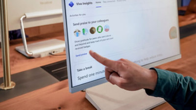 A Microsoft employee uses one of the Microsoft Viva modules: Viva Insights.