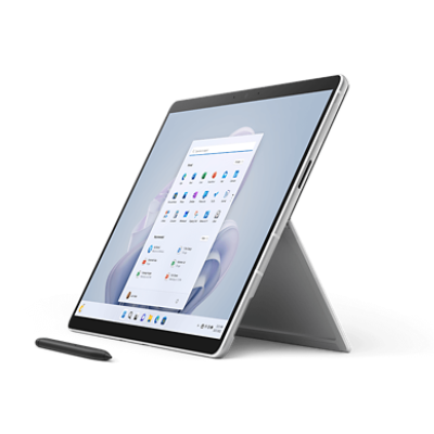 Platinum Surface Pro 9 with kickstand open and a Surface Pen