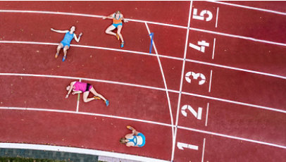 Group of tired athletes on a track