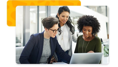 Three women looking at a laptop