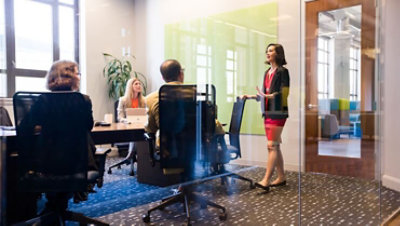 Stock photo of employees having a meeting.