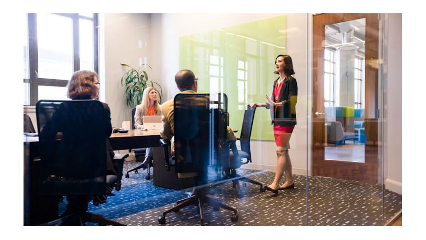 Stock photo of employees having a meeting.