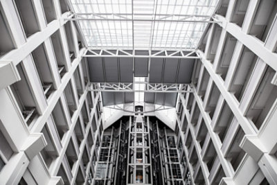Interior upward angle view of building entrance hall.