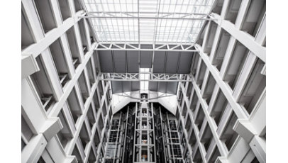 Interior upward angle view of building entrance hall.