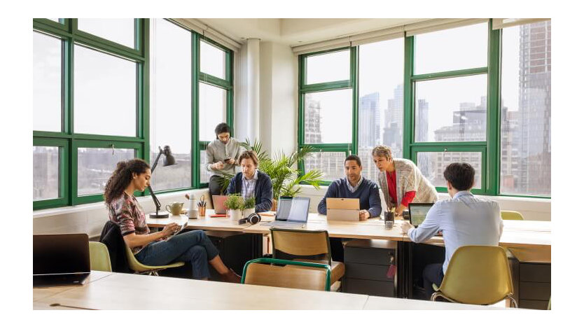 A group of coworkers collaborating in an office.