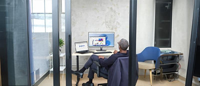 A person and person looking at a phone