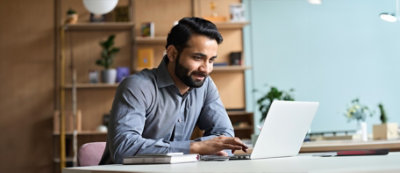 A person smiling at another person