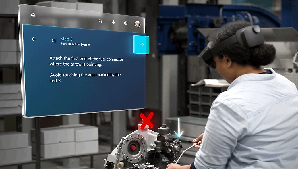 Un técnico de una fábrica sigue las instrucciones de una pantalla digital mientras ensambla un sistema de inyección de combustible marcado con una "x" roja.