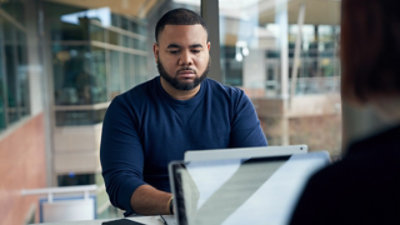 A man working with tab