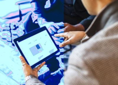 A close-up of hands holding a tablet.
