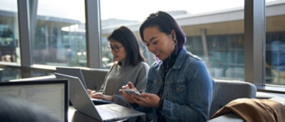 Two women working remote