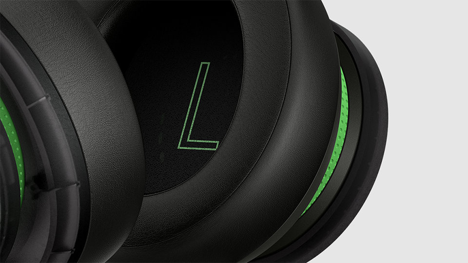 Close up of the left ear speaker of the Xbox Stereo Headset 20th Anniversary Special Edition.