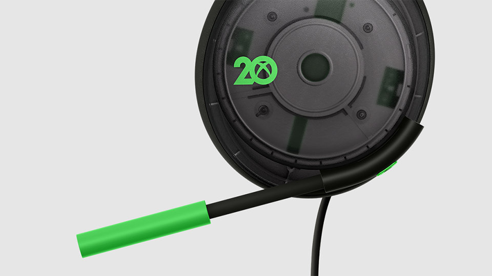 Side view of the Xbox Stereo Headset 20th Anniversary Special Edition and mic.