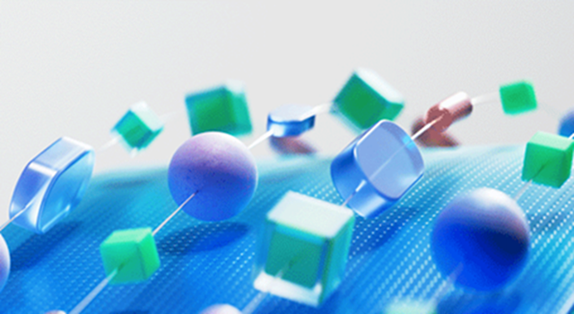 Abstrakte 3D-Formen in Blau, Grün und Lila auf strukturierter Oberfläche.