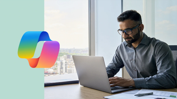 Man in front of a laptop.