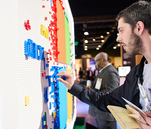 A man attending Microsoft Build 2025 participates in an activity.