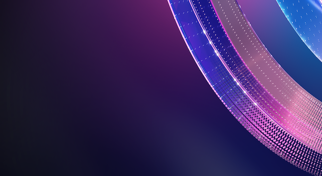 Abstract graphic with flowing, translucent ribbons in blue and purple tones on a dark background.