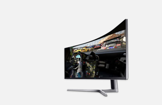 Samsung 49" CHG90 QLED Gaming Monitor with a racing game on screen.