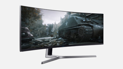 Slightly angled view of Samsung 49" QLED Gaming Monitor with a game on screen.