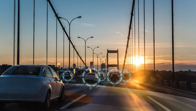 Cars crossing a bridge