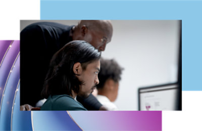 A man looking at a computer screen.