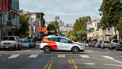 A Cruise car driving in a city.