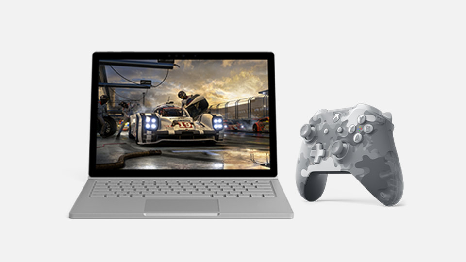 Laptop and left angled view of controller.