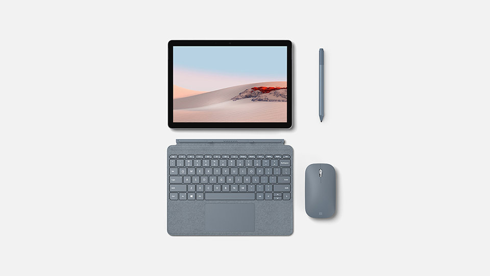 A Surface Go device with a type cover, touch pen and mouse.