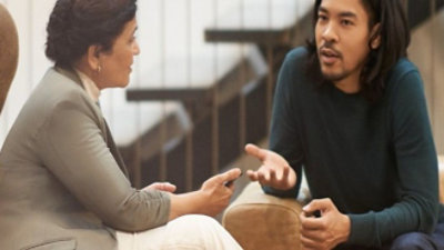 Two people talking