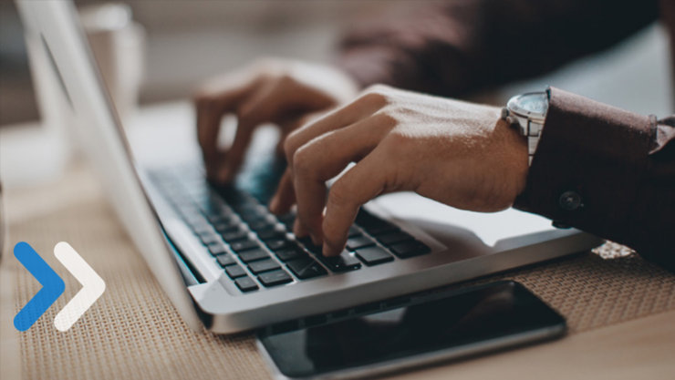 Close shot of person who is typing on laptop