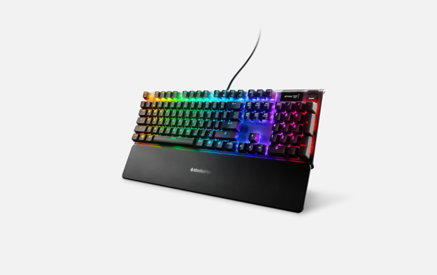 Angled view of Steel Series Apex 7 keyboard with RGB lighting.