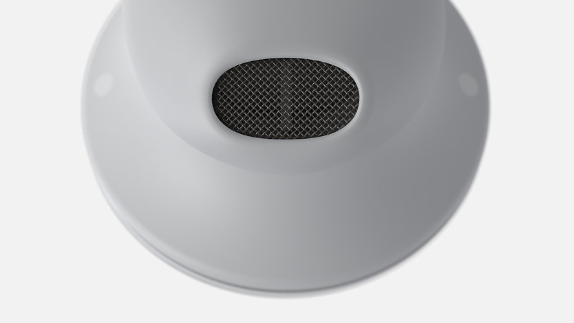 Primeiro plano de um altifalantes nos Surface Earbuds.