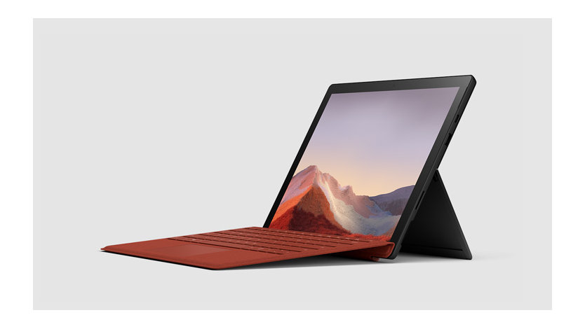 Surface Laptop 7 med Type Cover i färgen Poppy Red