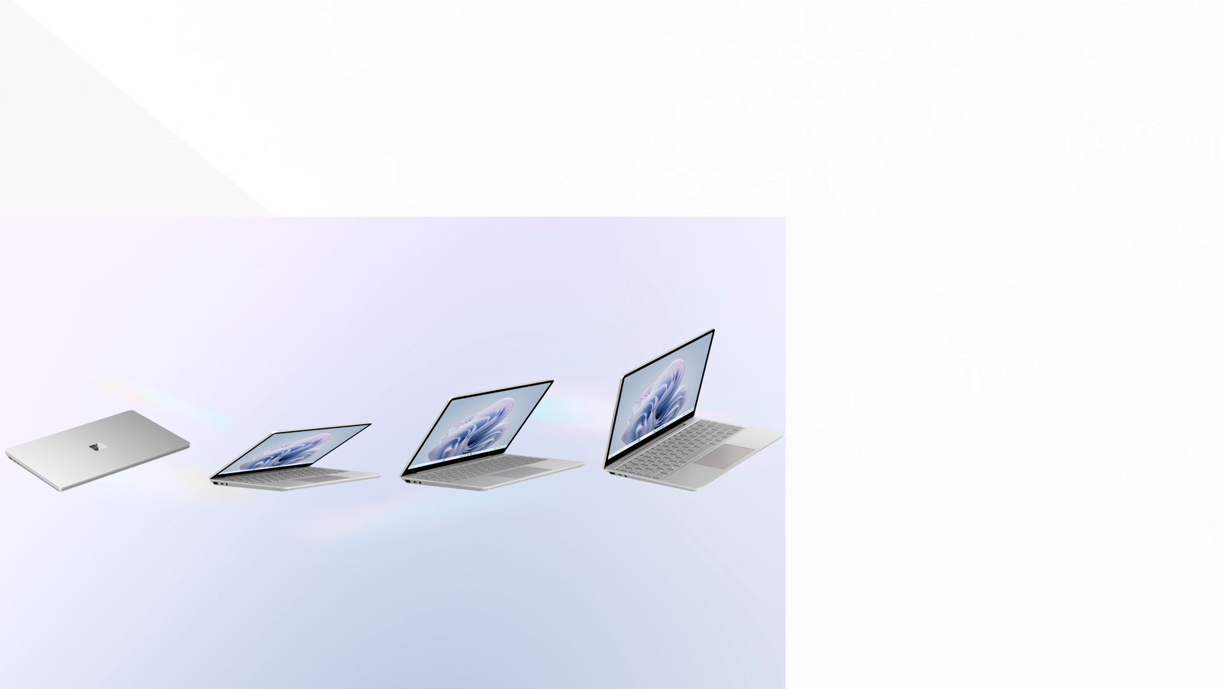 Fermo immagine dal video di Surface Laptop Go 3: da sinistra a destra, un modello nel colore Platino chiuso, uno nel colore Salvia che si apre in modalità Laptop, uno nel colore Sabbia aperto a metà in modalità Laptop e uno nel colore Blu ghiaccio aperto quasi completamente in modalità Laptop.
